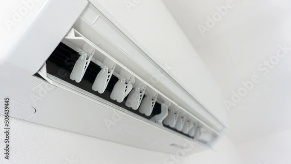 Fototapeta 壁に設置されたエアコン
