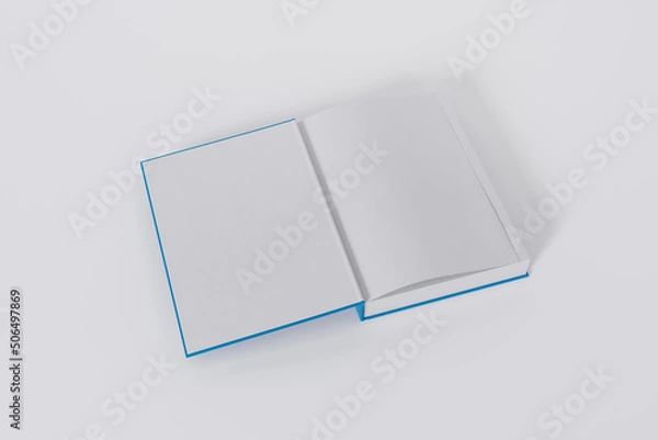 Fototapeta Mockup of a rectangular open on the first-page book with a blank, blue glossy cover on white background. Isolated with clipping path.