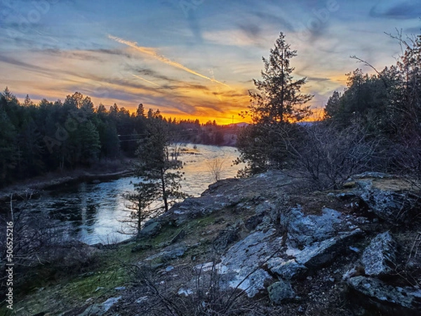 Obraz sunset on the rocks overlooking river