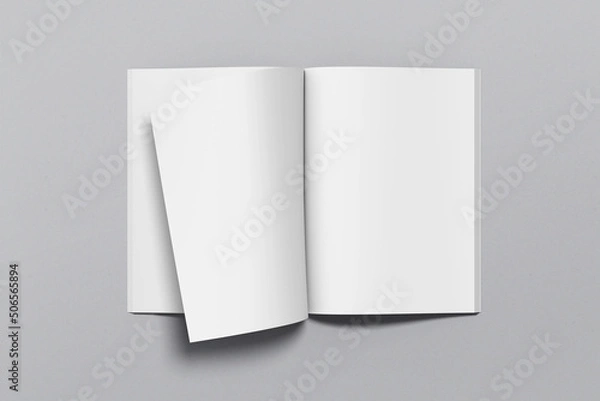 Obraz A4 magazine mockup top view, book or catalog on gray table. Blank page or notepad on solid background. Blank page or notepad for mockups or simulations.