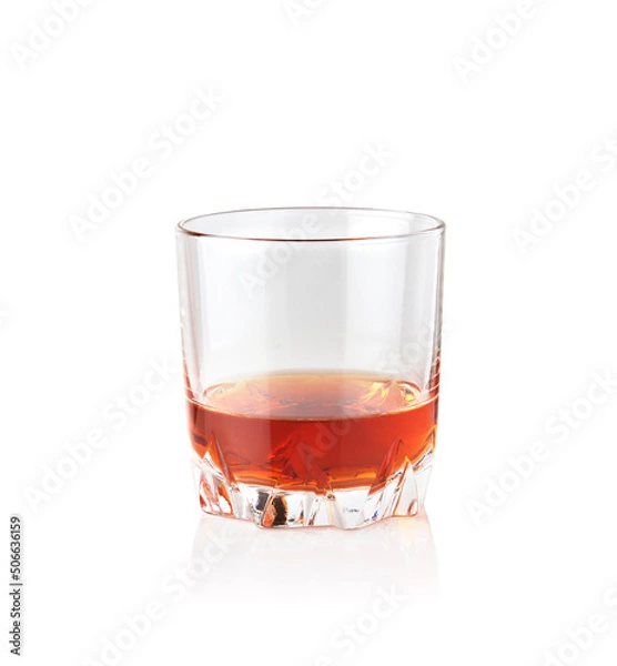 Fototapeta Alcoholic beverages. Scotch whiskey in elegant glass on white background