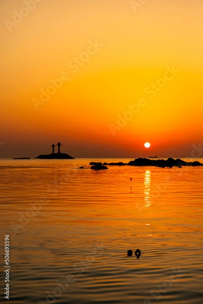 Fototapeta 젖병등대일출