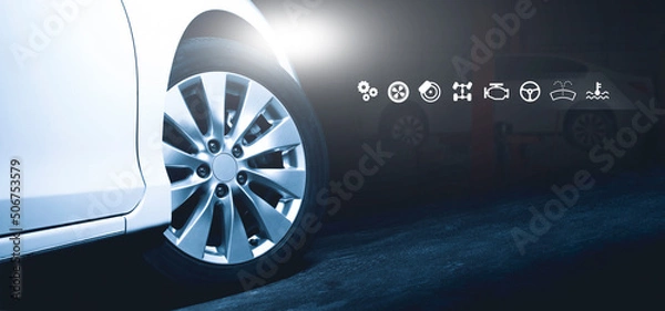 Fototapeta The white car open a headlight parked on the cement road at night time and auto service business icon,Double exposure,Auto repair shop business concept