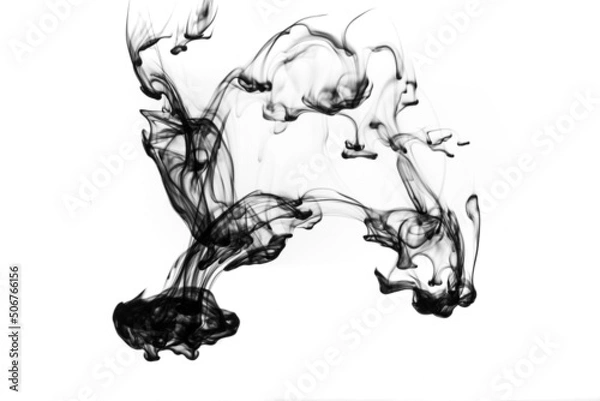 Fototapeta Black ink dropped into water isolated on white background。