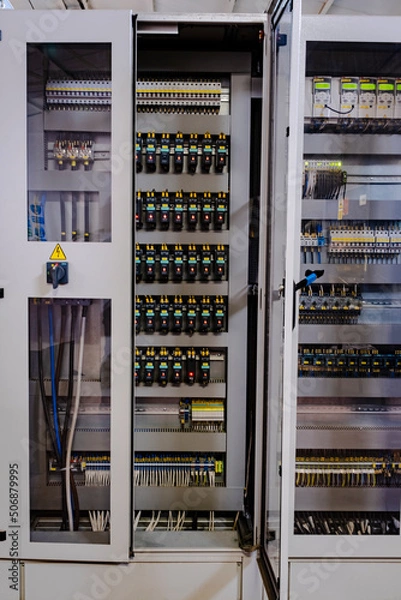 Fototapeta Factory Electric control panel enclosure for power and distribution electricity. Uninterrupted, electrical voltage.