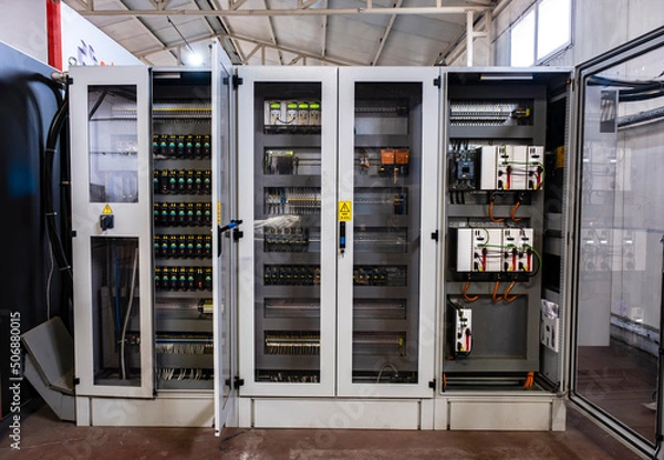 Fototapeta Factory Electric control panel enclosure for power and distribution electricity. Uninterrupted, electrical voltage.