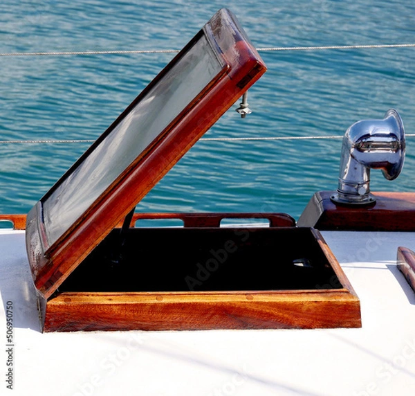 Fototapeta An open hatch on the deck of an old wooden boat