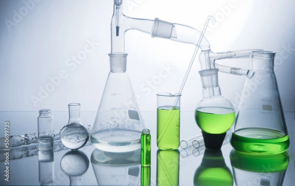 Obraz Laboratory glassware over white
