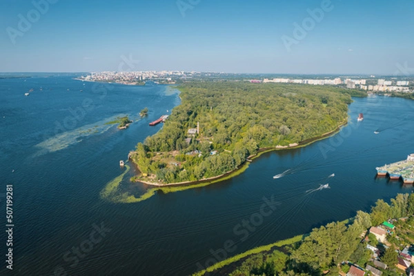 Obraz Aerial landscape view on Volga river with islands and green forest. Picturesque panoramic view from the height on the touristic part of the Volga river near Samara city at summer sunny day.