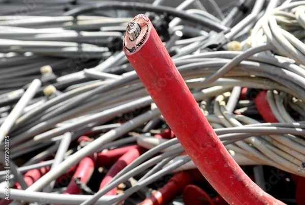 Fototapeta recyclable copper core of the electric cable for very high voltages in the container of cables used