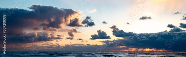 Obraz Sky as a texture Sunshine through rain clouds