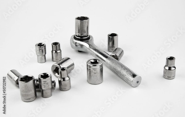 Fototapeta Вороток и головки на белом фоне.