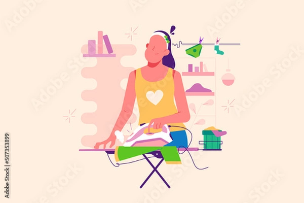 Fototapeta Young woman ironing washed things, housework and housekeeping