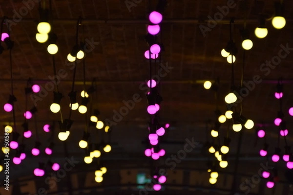 Fototapeta colorful lights yellow and violet bokeh party 
