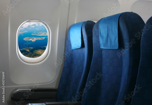 Obraz airplane seat and window