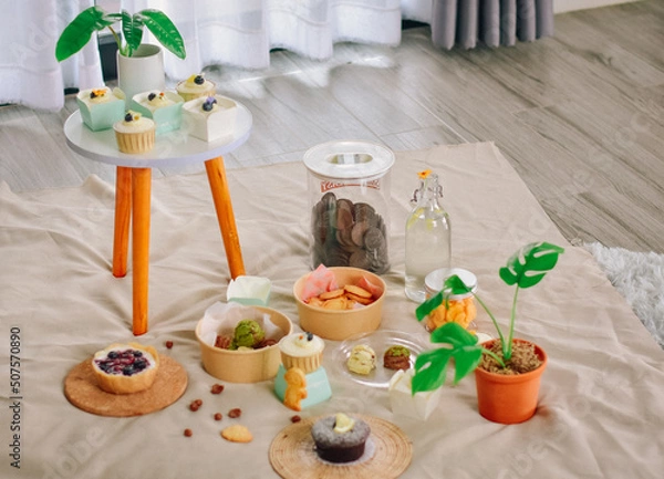 Fototapeta For dessert, a tasty treat, place on a soft, light creamy fabric