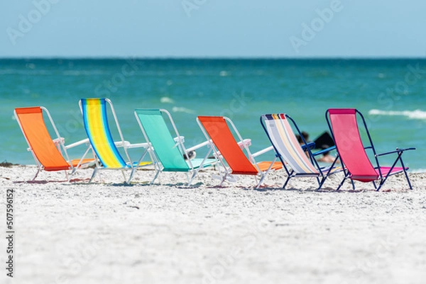 Obraz Beach chairs lined up on sand