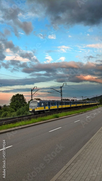 Obraz Train on railway cross the mountain for local transportation.