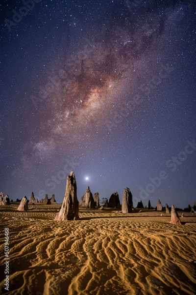 Obraz The Pinnacles are amazing natural limestone structures, formed approximately 25,000 years ago after the sea receded and left deposits of sea shells. Coastal winds removed the surrounding sand