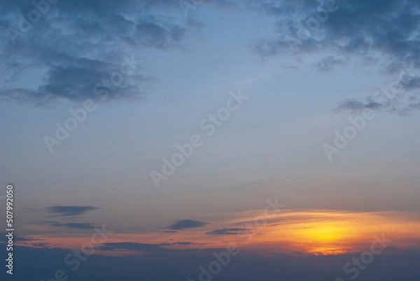 Fototapeta sunset with reflections and cloudy sky
