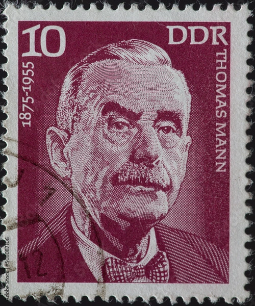 Fototapeta GERMANY, DDR - CIRCA 1975 a postage stamp from GERMANY, DDR, showing a portrait of the writer and Nobel Prize winner Thomas Mann (1875–1955) . Circa 1975