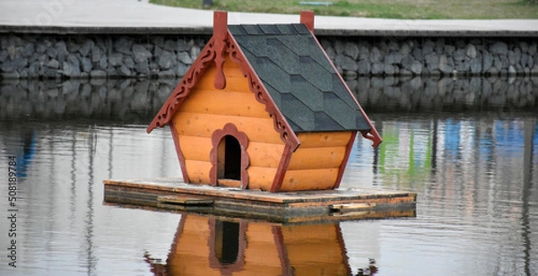 Obraz A duck house on the pond
