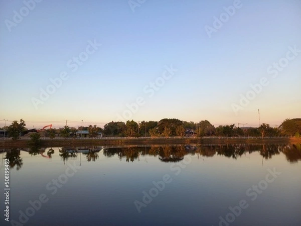 Obraz sunset over the river