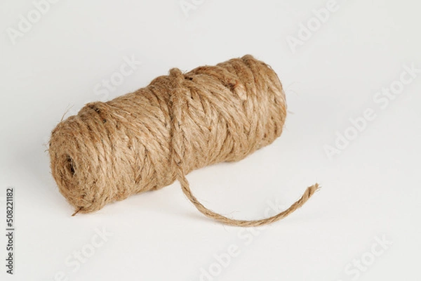 Fototapeta Skein of Jute twine on a white background