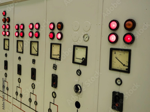 Obraz control panel on the wall of a factory