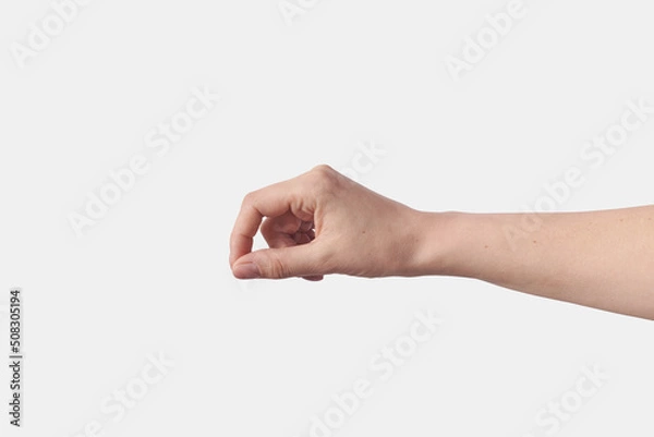 Obraz Invisible object holding hand isolated on white