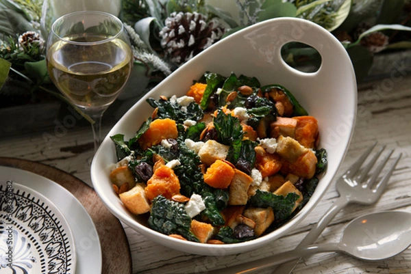 Obraz Winter Panzanella Salad with butternut squash, crispy kale, goat cheese, toasted bread croutons, squash seeds and dried cherries