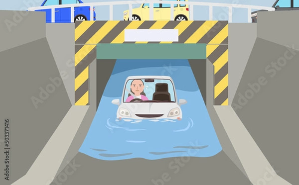 Fototapeta 冠水したアンダーパスで立ち往生する車と中年男性
