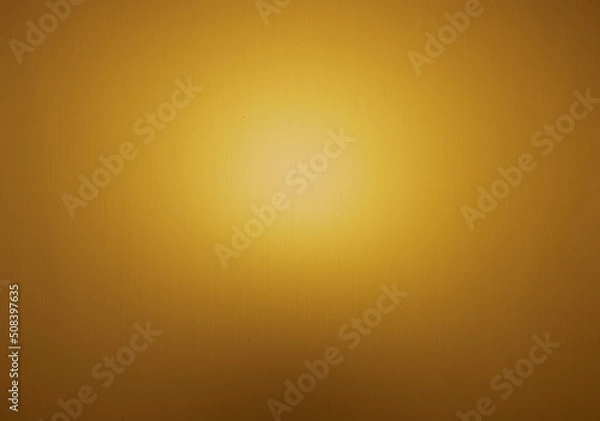 Obraz Photo of orange light on a background on a cloth surface.