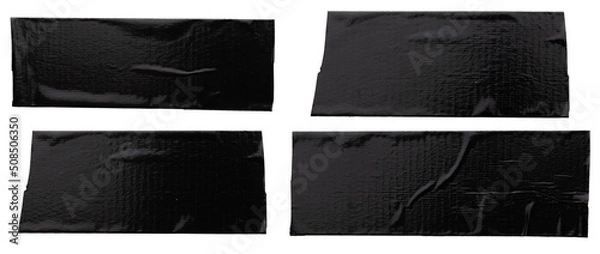 Obraz Torn horizontal and different size black glossy sticky tape, sticky pieces isolated on white background. Set of black tapes.