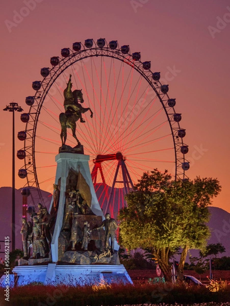 Obraz Ataturk statue and Ferris wheel