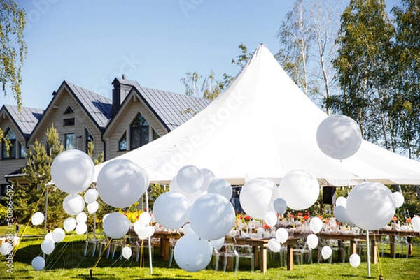 Obraz Wedding tent with large balls. Tables sets for wedding