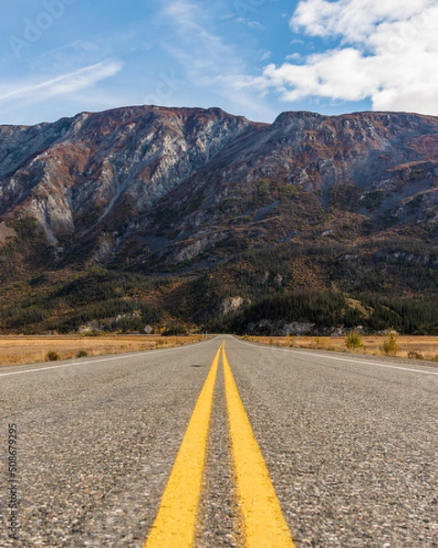 Obraz Views along the Alaska Highway in fall, autumn season with magnificent, towering mountains in the distance. 