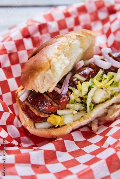 Obraz Top view of a hot dog in a takeout container