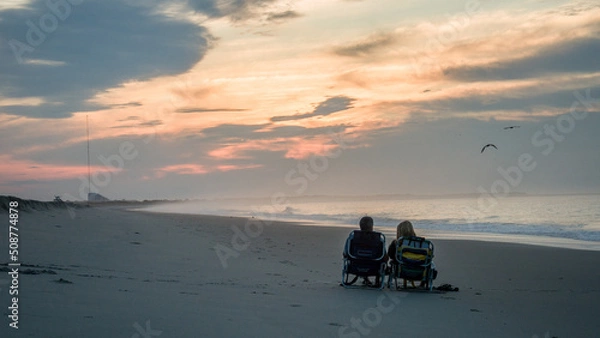 Fototapeta Retired couple on the beach