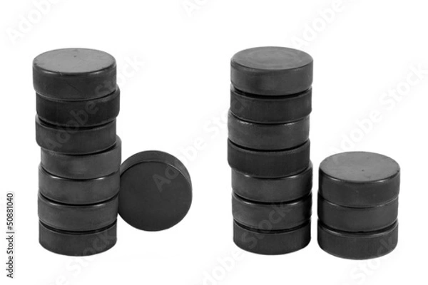 Obraz Stack of hockey pucks