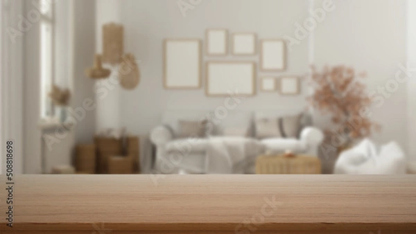 Obraz Empty wooden table, desk or shelf with blurred view of scandinavian living room, white sofa, frame mockup and decors, modern interior design concept