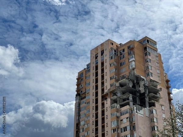 Obraz Residential building damaged after rocket missile attack during war