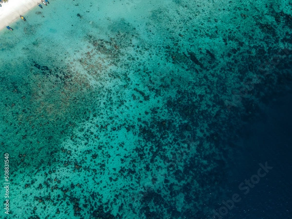 Fototapeta Aerial view of the turquoise waters around the island of Koh Phi Phi Don