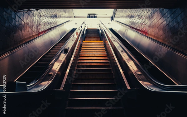 Fototapeta The escalators view from below of subway station in the Upper East Side Historic District of New York City. Cinematic style. 