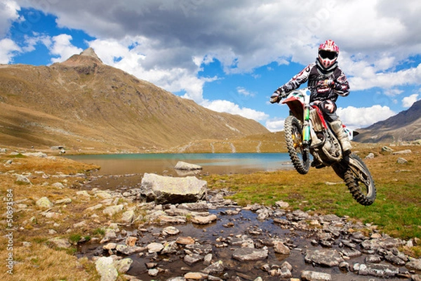 Obraz motocross w wysokich górach