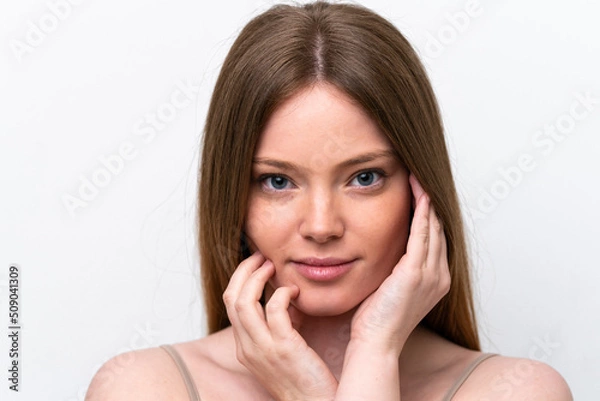 Fototapeta Young caucasian woman isolated on white background . Portrait