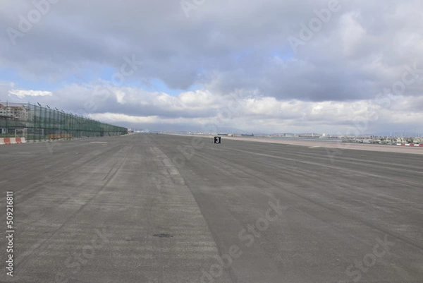 Fototapeta Gibraltar, United Kingdom - 07 november 2019: runway between Spain and Gibraltar. Gibraltar. British Overseas Territory. UK.