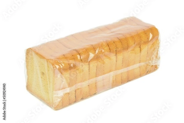 Fototapeta A sealed packet of crispbread slices on a white background