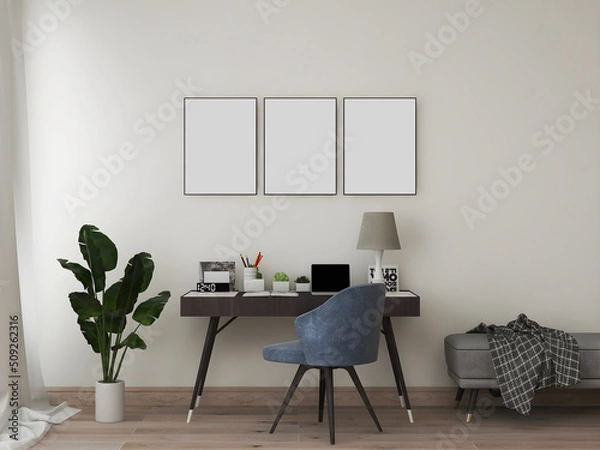 Obraz Desk room or home office mockup with 3 blank frames, desk and object, blue chair, plant, and sofa. 3d rendering. 3d illustration