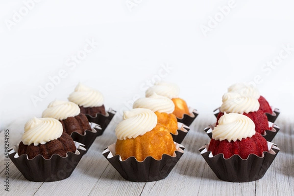 Fototapeta Mini Bundt Cakes with Cream Cheese Icing